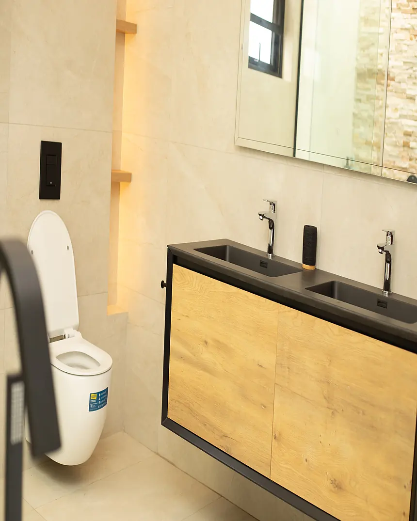 Bathroom vanity detail with timber cabinetry
