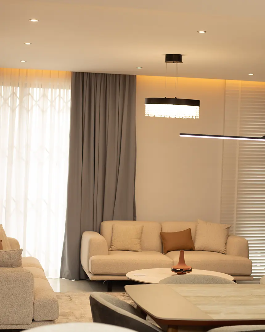 Seating area with timber shelving and warm lighting