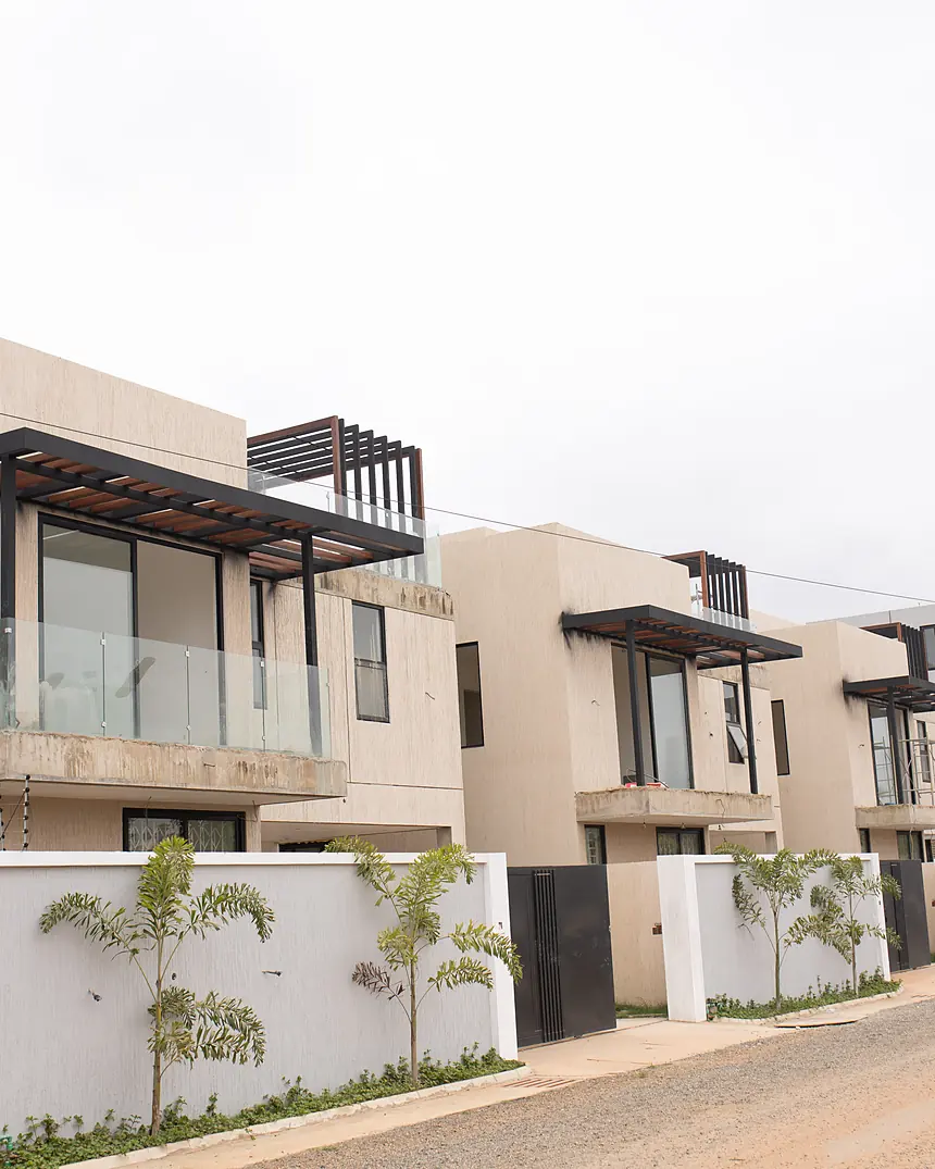 Gated community driveway and townhouse terraces